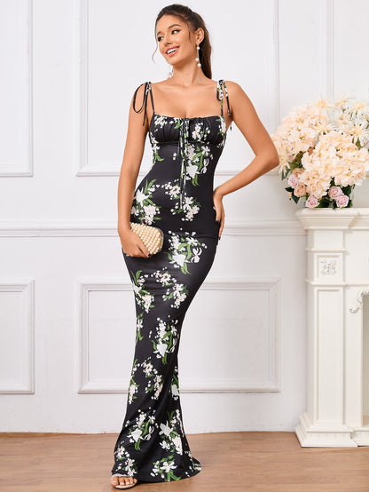 Charmante bloemenprint feestjurk met elegante strik-schouderband en fishtail zoom