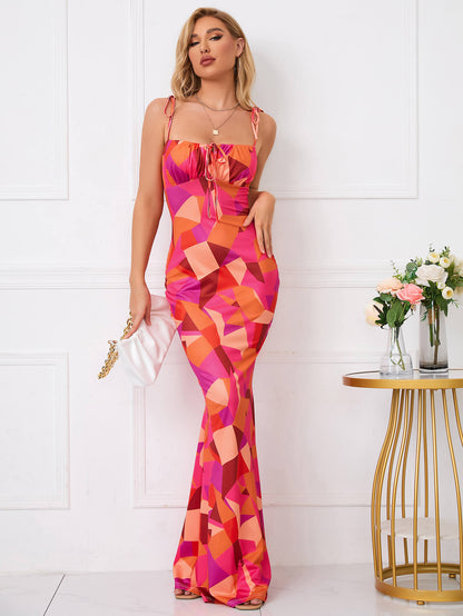 Charmante bloemenprint feestjurk met elegante strik-schouderband en fishtail zoom